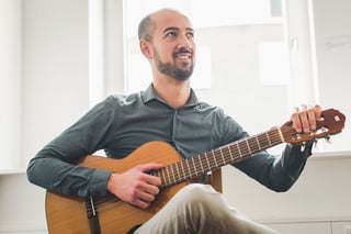 Acoustic guitar smiling
