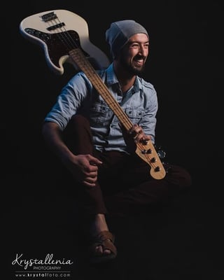 Man with bass guitar beanie